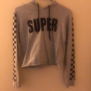 Cropped, super hooded shirt.